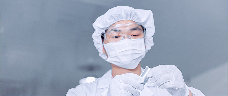 Manufacturing Services Engineers Studying Capacitors